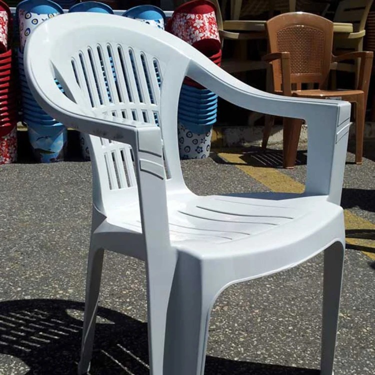 Plastic chair with armrests